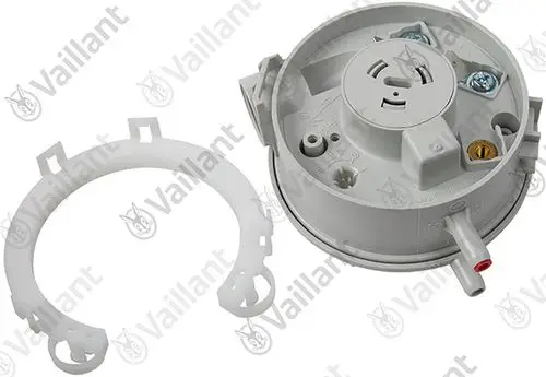 Vaillant Druckwächter mit rundem Gehäuse, Anschlussmöglichkeiten und Halterung. Teile auf weißem Hintergrund, mit klaren Kabelanschlüssen.